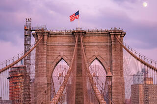 Moon over the Brooklyn Bridge.